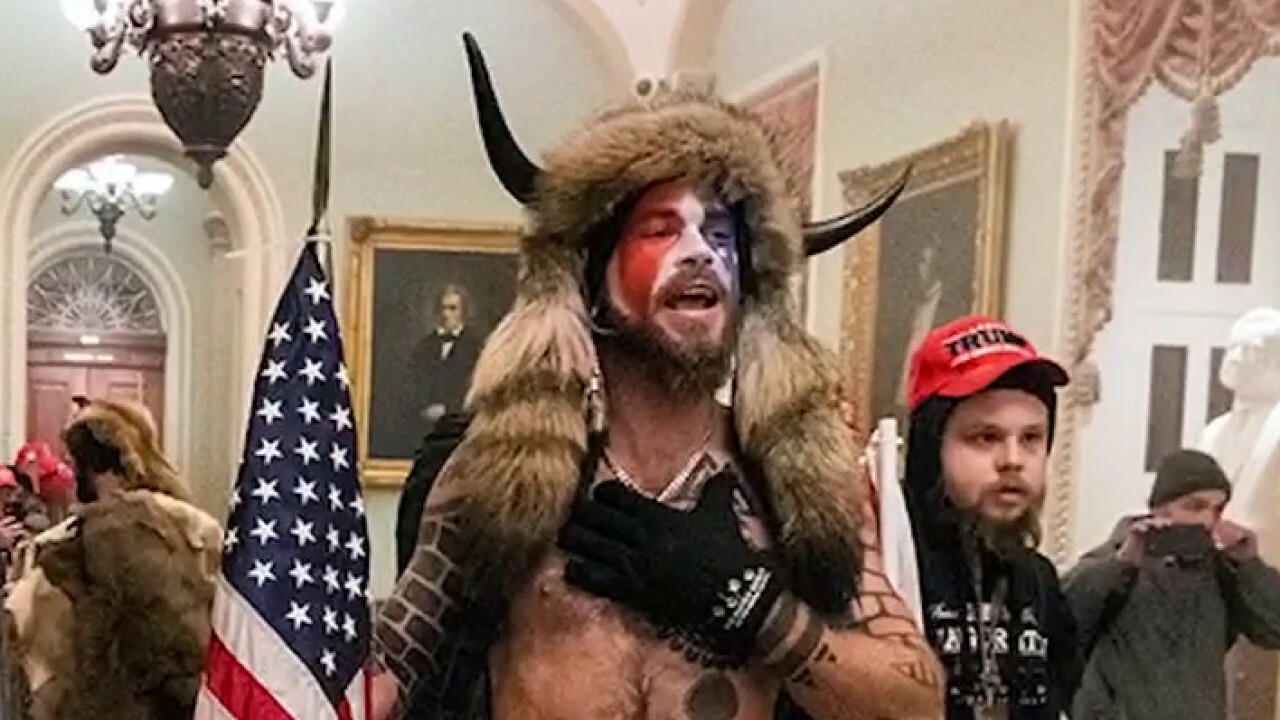 Man wearing horns at Capitol lost 20 pounds in custody: lawyer