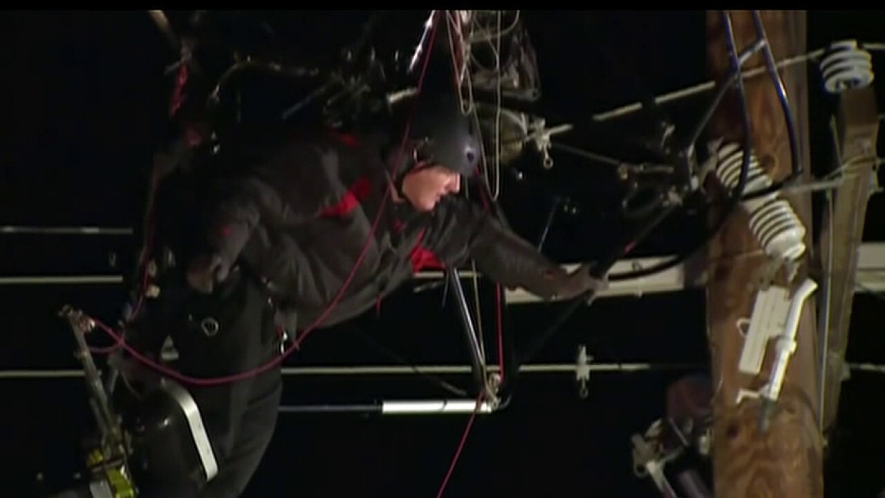 Trapped paraglider rescued from tangled power lines in California