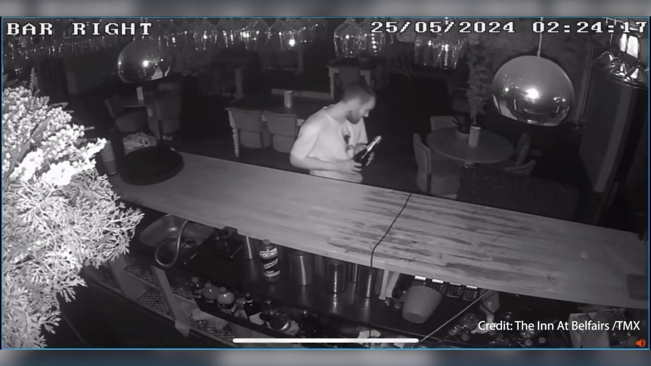 Drunken thief pops bottle of prosecco and raids cash register in bar surveillance video