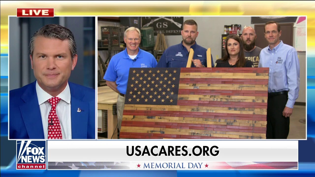 Veteran-owned flag company displays new wooden flag
