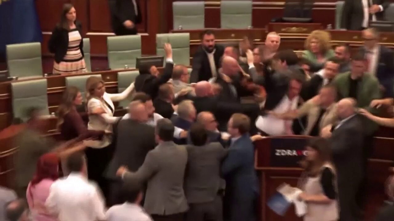 Kosovo lawmakers brawl after opposition party member throws water on prime minister