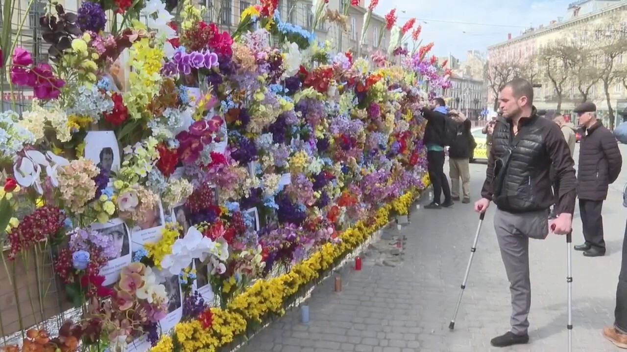 Florida man in Ukraine creates tribute wall for victims from Russia's war