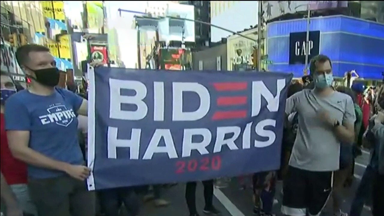 Crowds gather in Times Square after Biden projected to win election