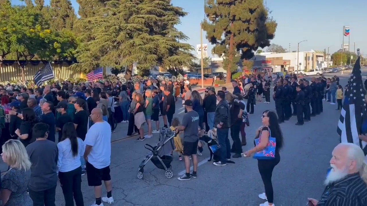Hundreds gather at vigil honoring two fallen El Monte officers 