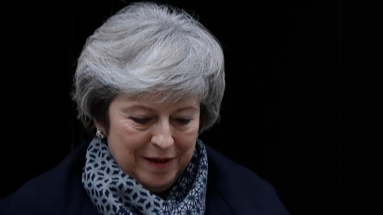 Theresa May faces no confidence vote following Brexit plan defeat