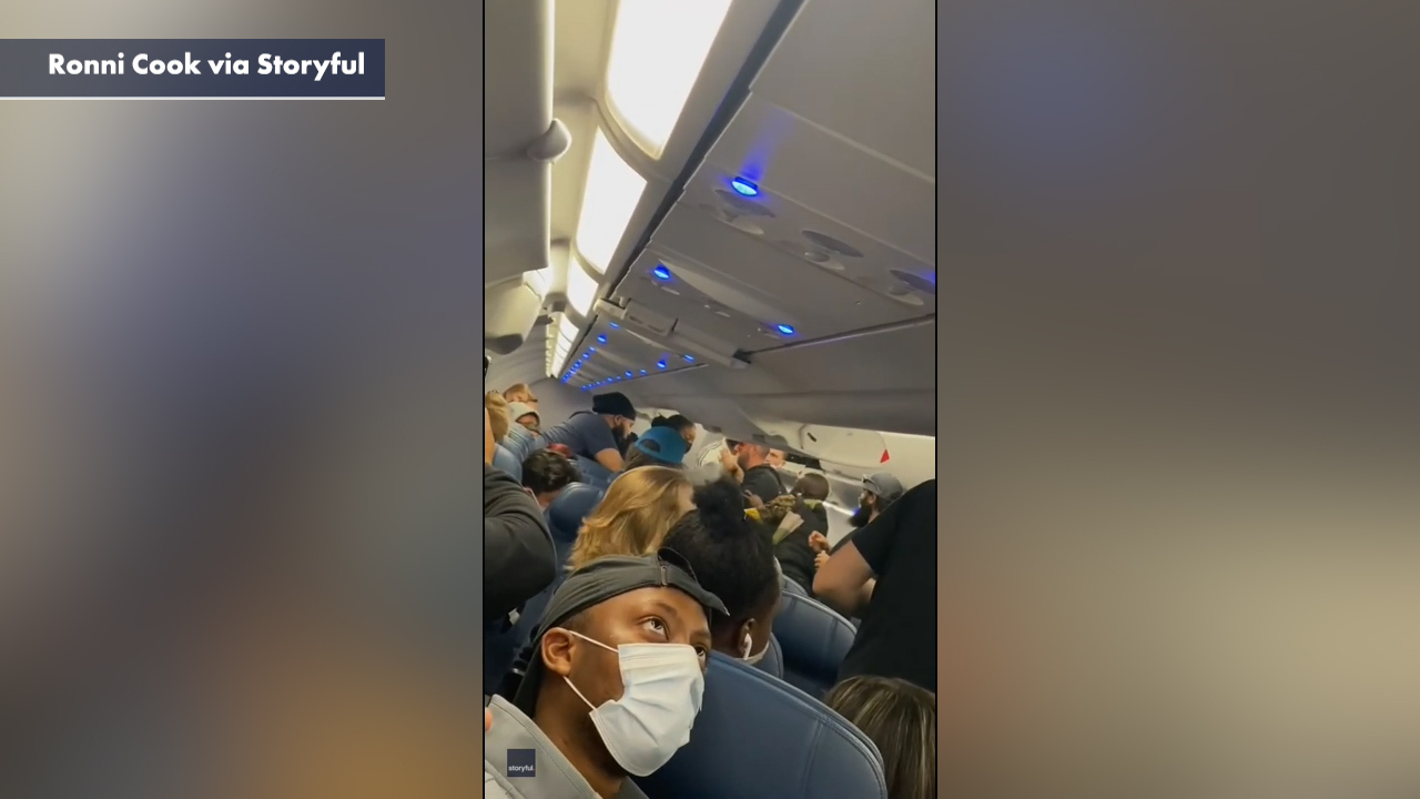 Video captures a man involved in a fight aboard a Delta Air Lines flight. 