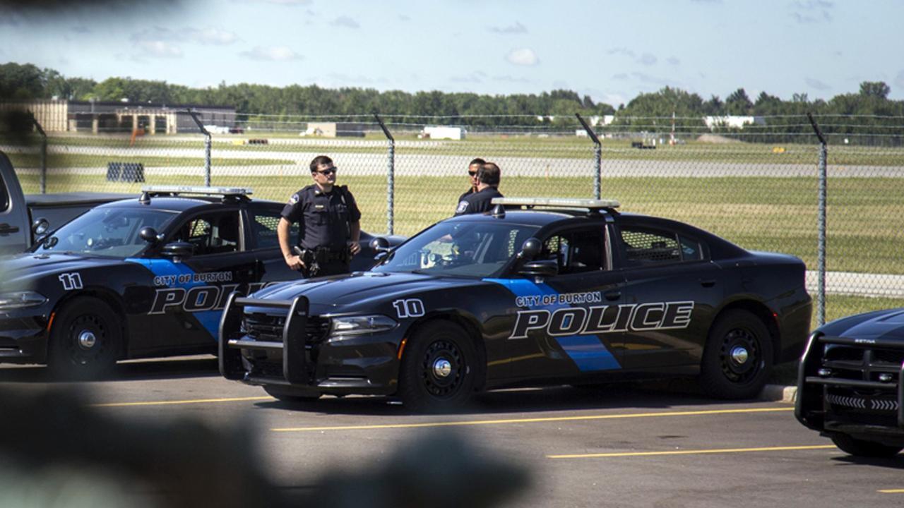 Suspect in custody after officer stabbed at Flint airport