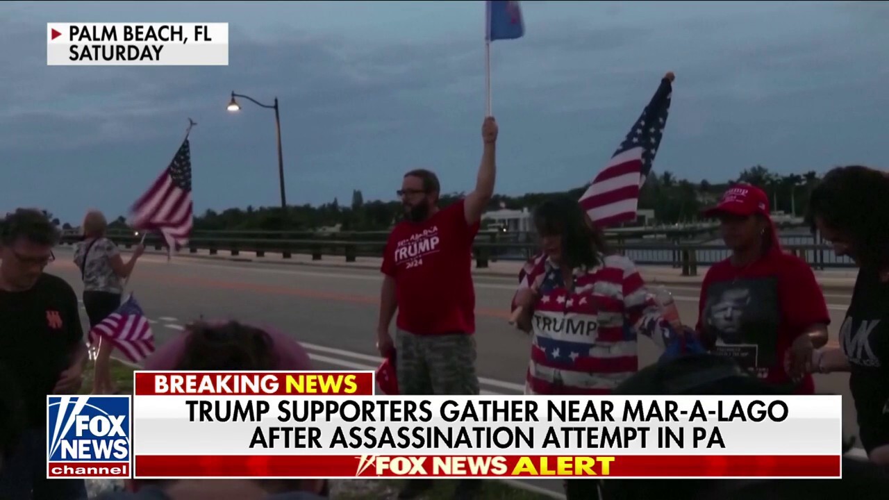 Trump supporters gather near Mar-a-Lago after rally shooting