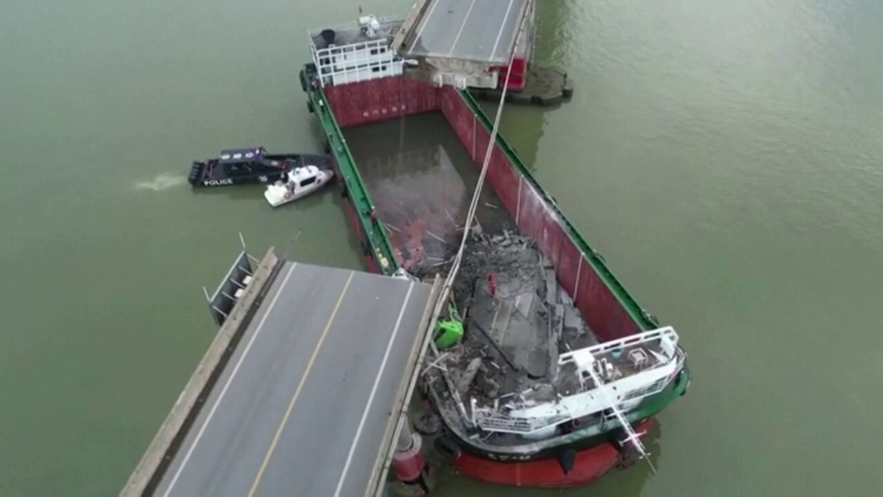 Barge hits China bridge, killing 5 and sending vehicles falling into the water