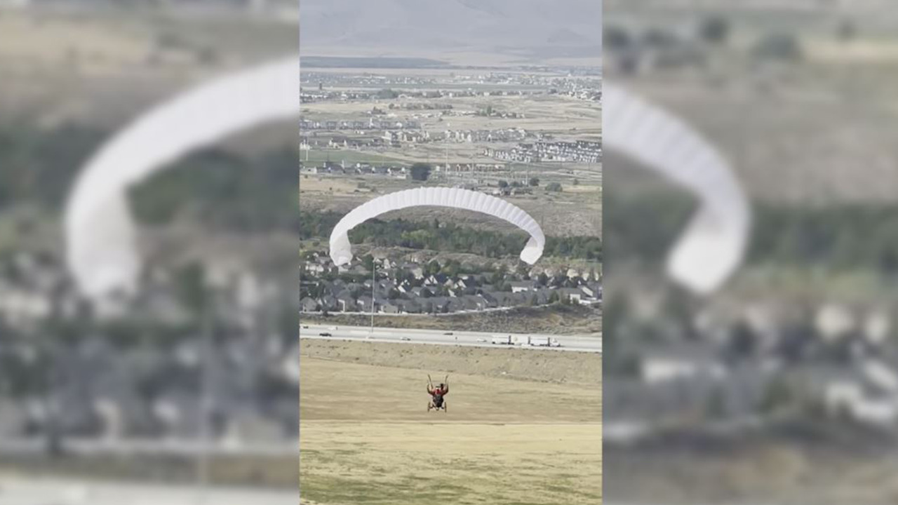 Nevada-based non profit offers paragliding free of charge for those who 'need a lift'