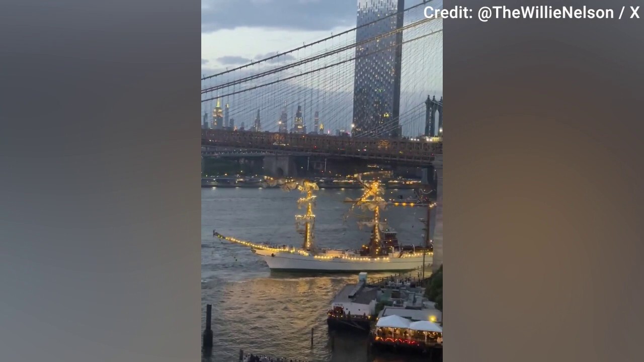 Massive sailing vessel guided by tugboat crashes into Brooklyn Bridge