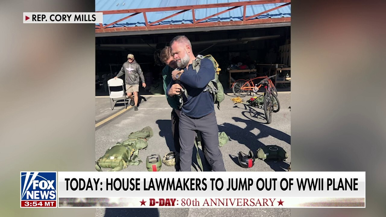 House lawmakers jump out of WWII-era plane to honor D-Day anniversary