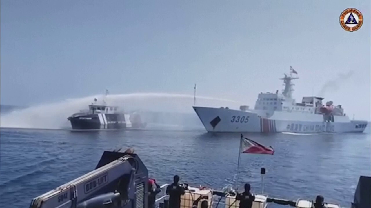 China blasts Philippine boat with water cannon, military says