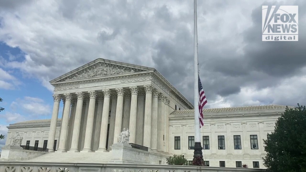 Flag outside the U.S. Supreme Court lowers to commemorate Queen Elizabeth II