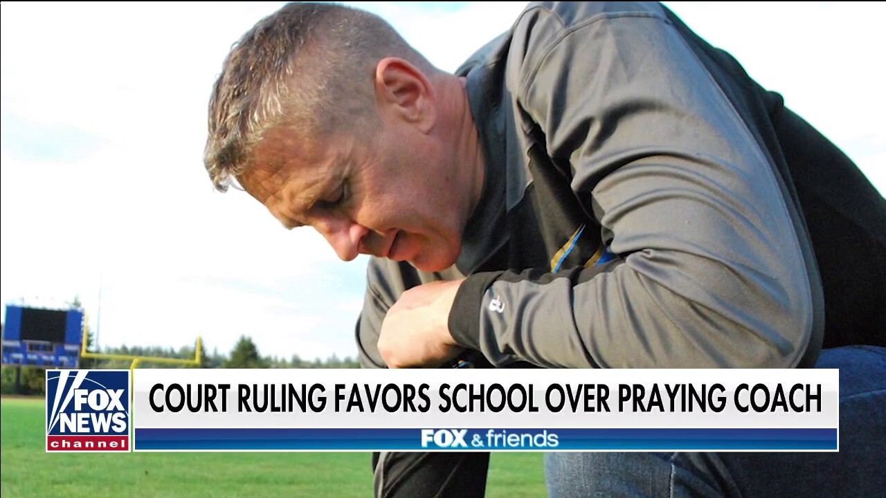 Football coach vows to keep fighting after legal setback over on-field prayer 