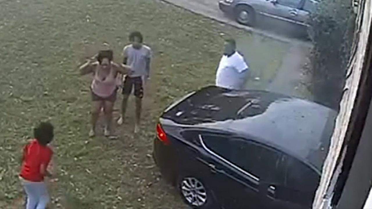 Graphic content: Speeding car hits young girl playing in her front yard.