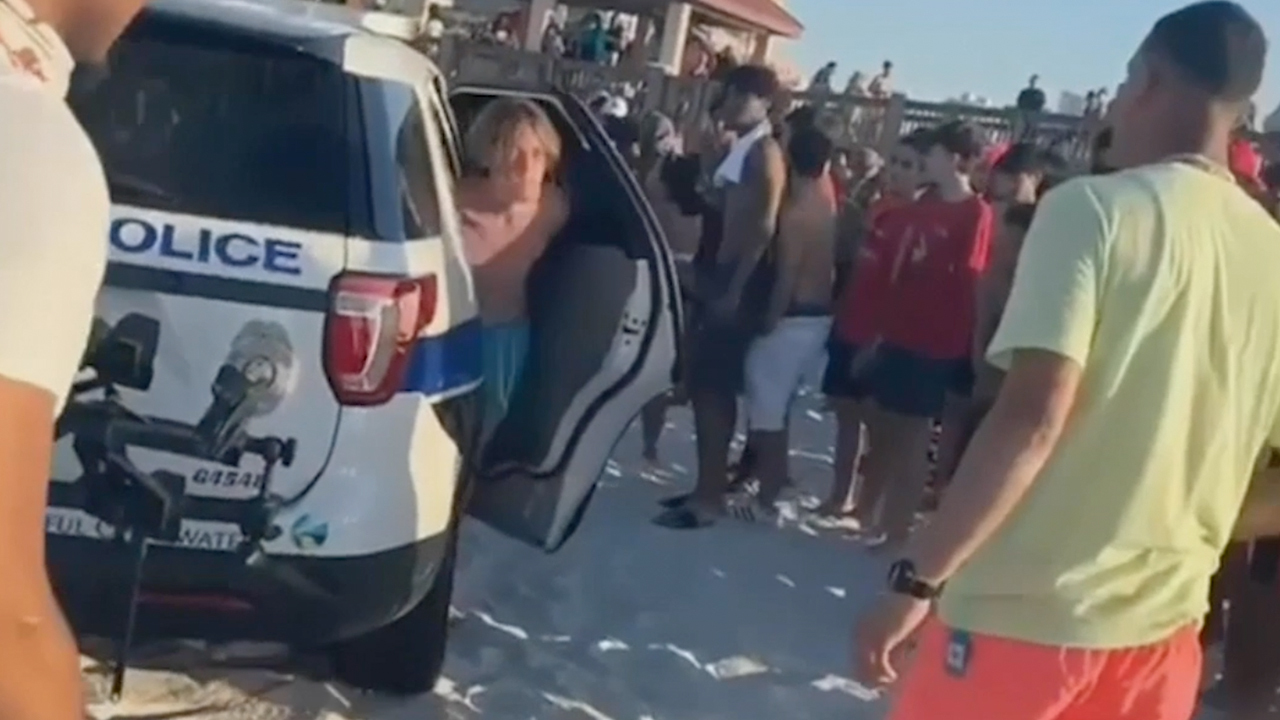 Viral video shows handcuffed Spring Breaker fleeing cop car