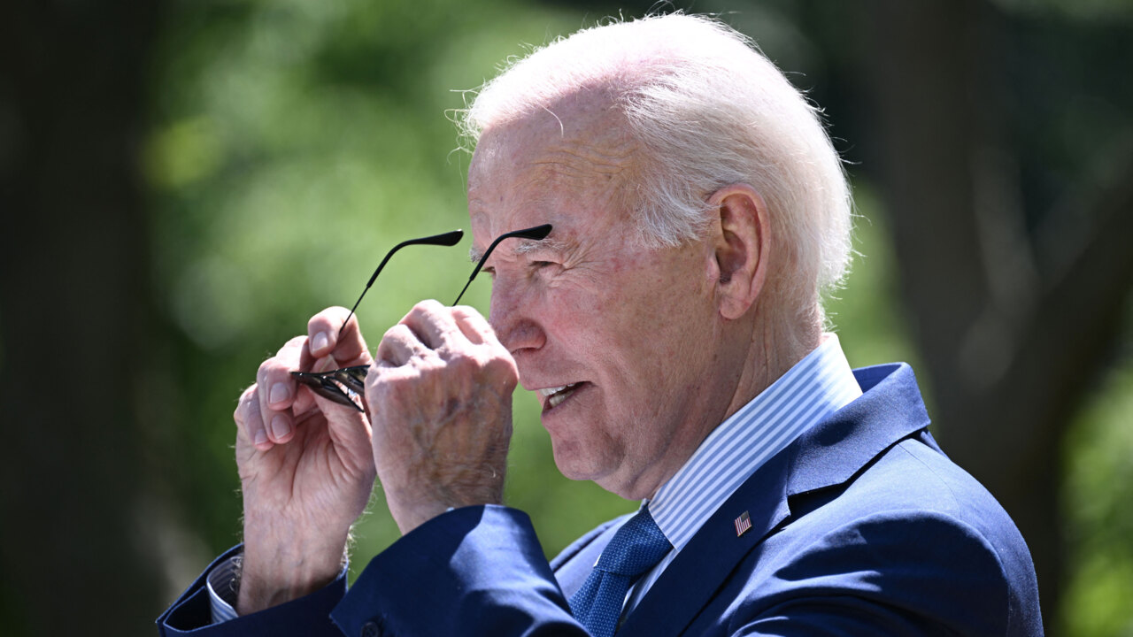 Biden jokes he's a 'very dull president', only known for his sunglasses and chocolate chip ice cream