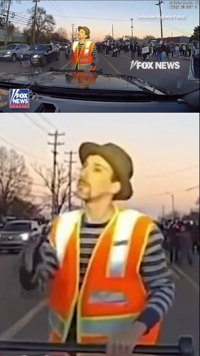  A man in Tennessee blocked a trooper’s vehicle, grabs it and appears to fall backward on his own. 