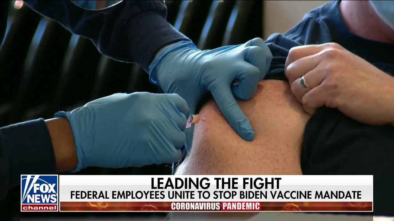 Vaccine mandate debate rages on as Biden declares COVID-19 pandemic 'over'
