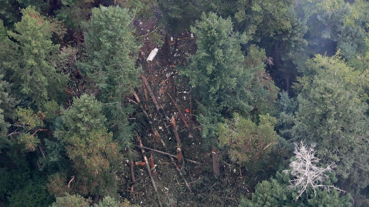 Investigators search site of Seattle plane crash