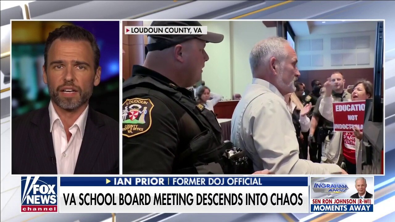 Virginia school board meeting descends into chaos