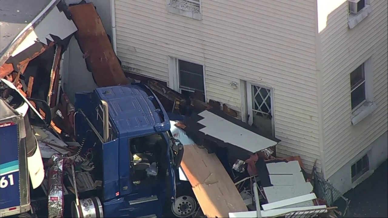 Tractor trailer crashes into New Jersey home