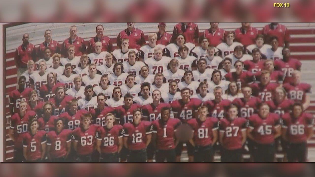 Teen arrested for flashing privates in yearbook football pic