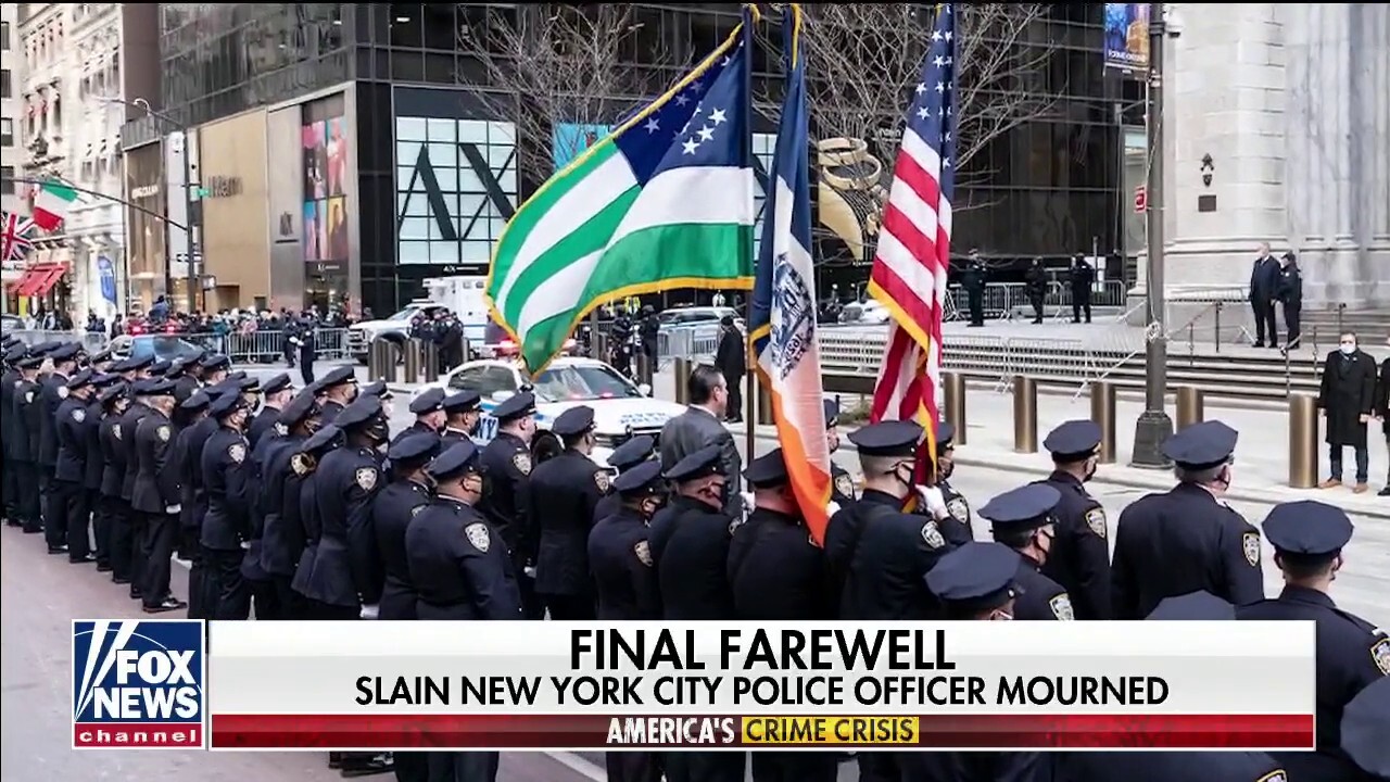 Thousands mourn the loss of New York City police officer
