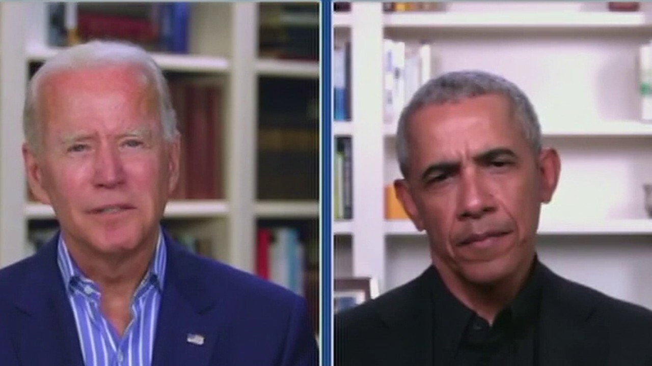 Joe Biden and Barack Obama reunite; plexiglass divides America	