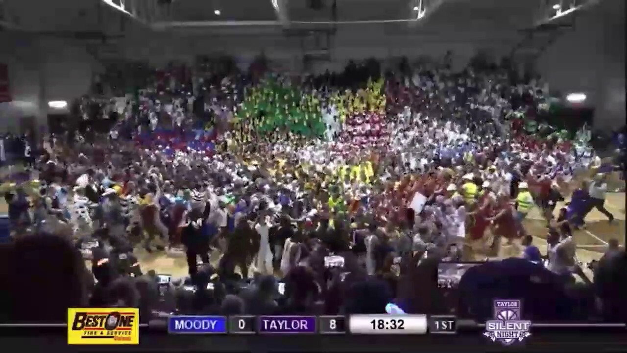 Taylor University basketball fans storm the court for ‘Silent Night’ game tradition