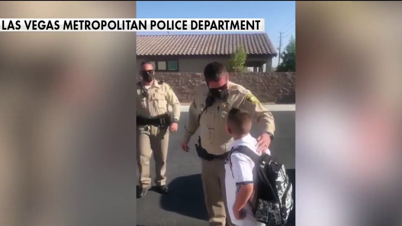 Las Vegas police escort son of officer who died from COVID to first day of school