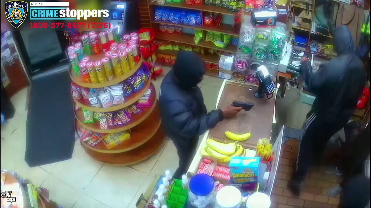 Queens, New York store robbery at gunpoint