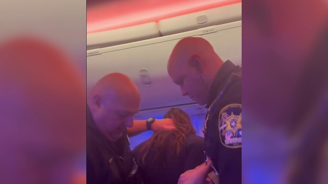 Alleged drunk woman handcuffed and removed from Southwest flight in New Orleans