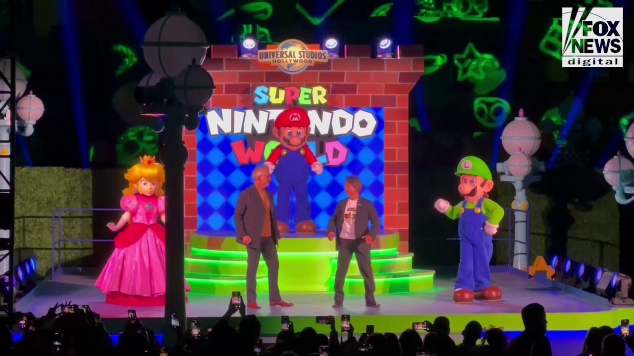Mario, Luigi and Princess Peach celebrate the opening of Super Nintendo World at Universal Studios