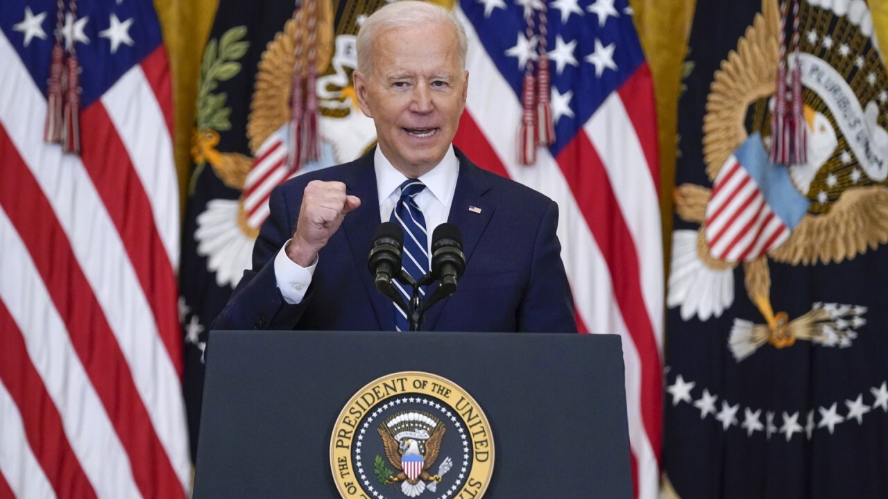 How did President Biden perform during first solo news conference?