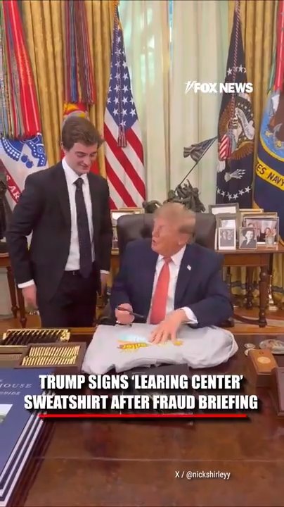 WATCH: Trump signs 'Learing Center' sweatshirt after fraud briefing