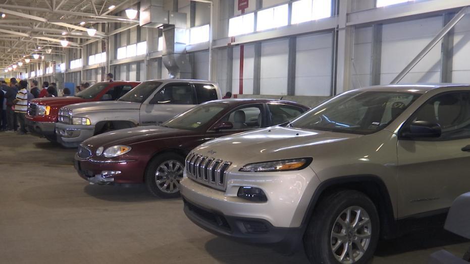 Airport auctions off lost and found items, abandoned cars