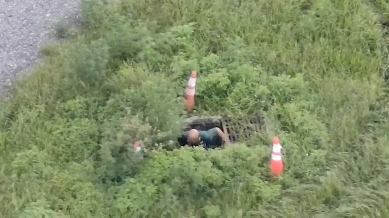 Florida sheriff's deputies arrest man crawling out of sewer grate