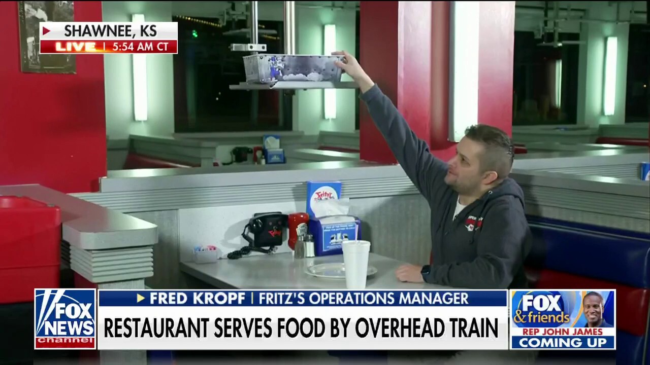 Kansas restaurant goes viral for serving food with overhead train system