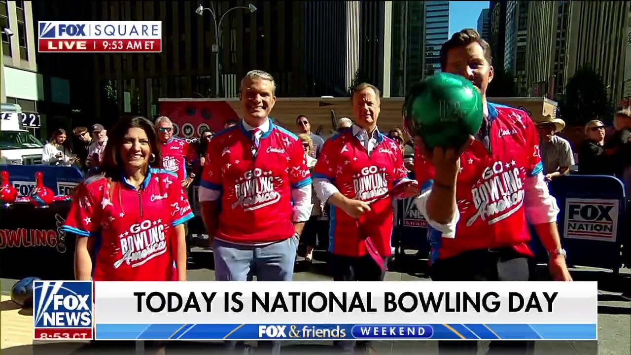 Pro bowlers give lessons to hosts on National Bowling Day