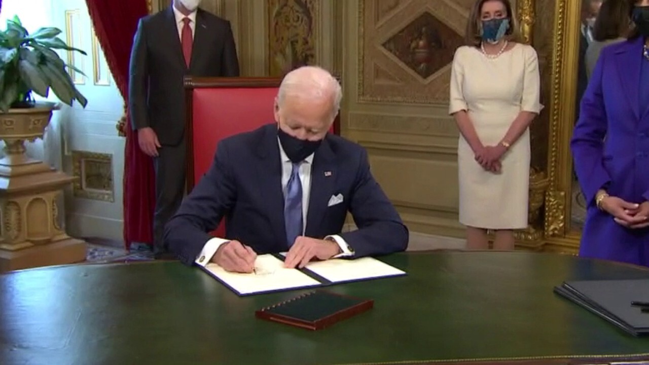 Biden begins to reverse 'America First' agenda with executive orders