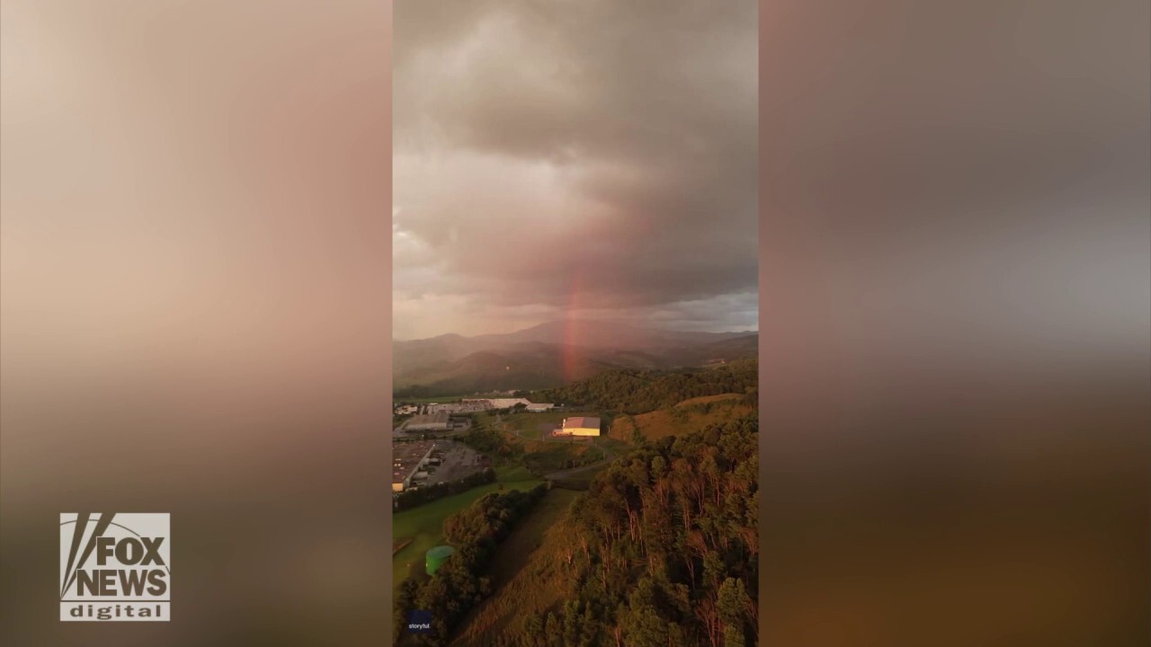 Rainbow seen emerging from clouds in stunning drone video