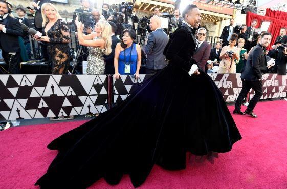 Oscars fashion: Billy Porter defies tradition and steps out onto the red carpet in a gown by designer Christian Siriano