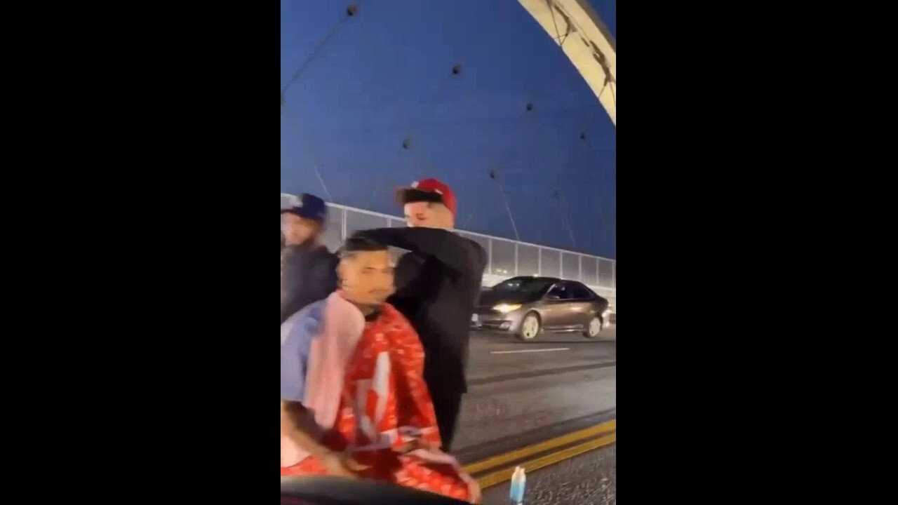 Man gets haircut in traffic on newly opened Los Angeles bridge 