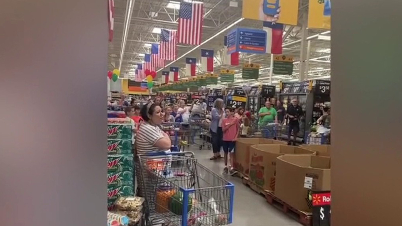 Texas Walmart shoppers sing 'The Star-Spangled Banner' during 4th of July