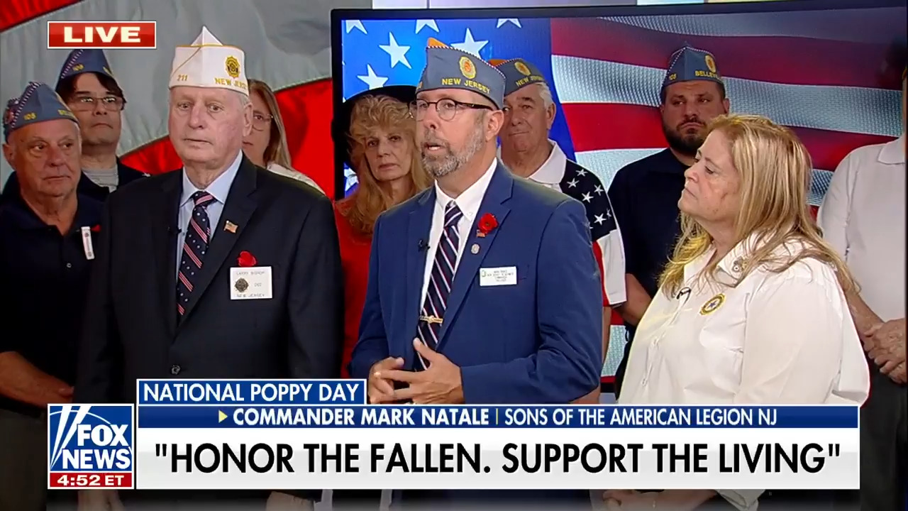 American Legion members explain the significance of Poppy Day