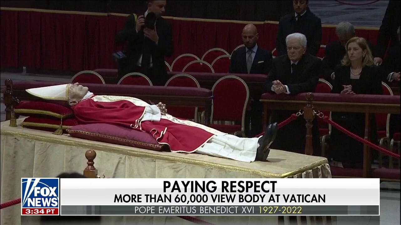 Pope Emeritus Benedict XVl lies in state as thousands of mourners pay tribute