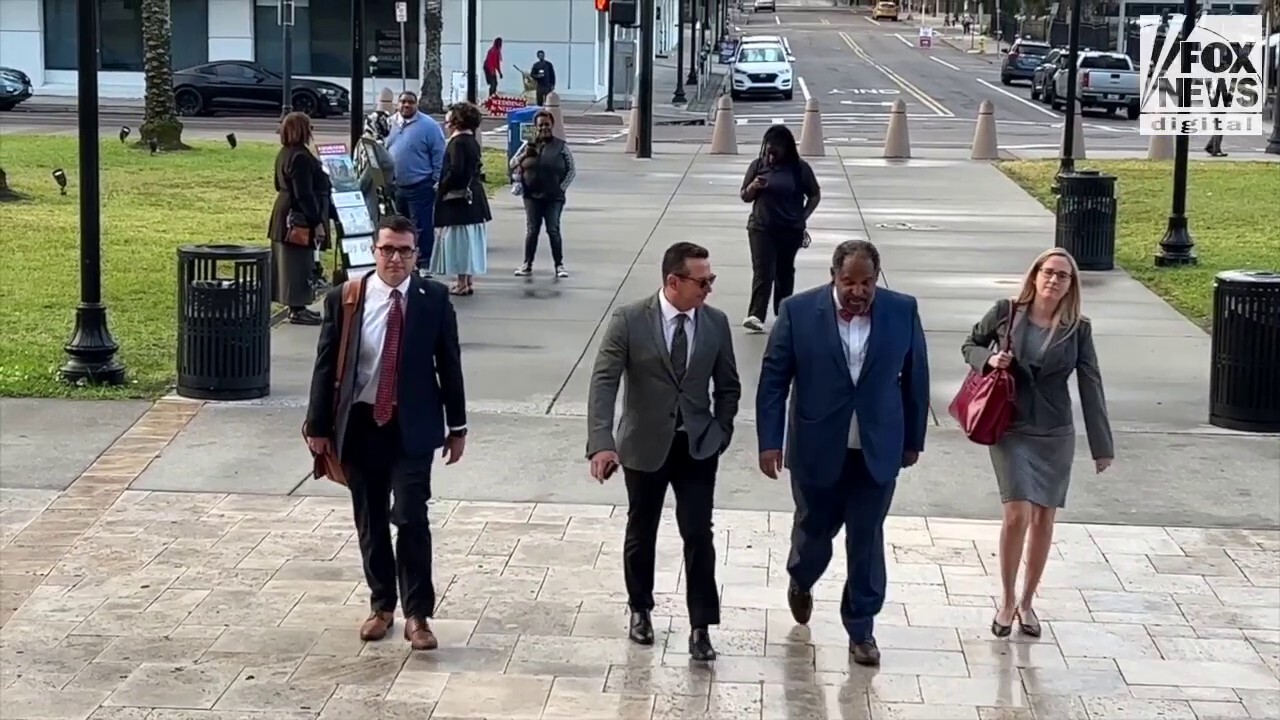 Attorney Jose Baez arrives at the Duval County Courthouse