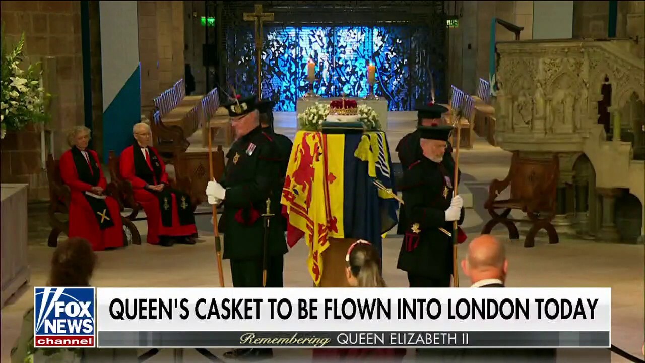 Queen Elizabeth II's casket flown into London